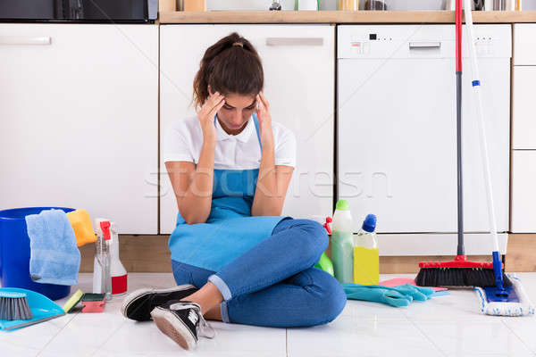 Young Woman Sitting On Kitchen Floor Stock photo © AndreyPopov