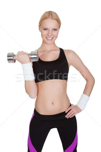 Fitnessz nő súlyzós edzés gyönyörű fiatal izolált fehér Stock fotó © AndreyPopov