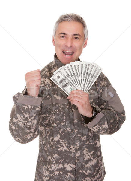 Happy Mature Soldier Holding 100 Dollar Bills Stock photo © AndreyPopov
