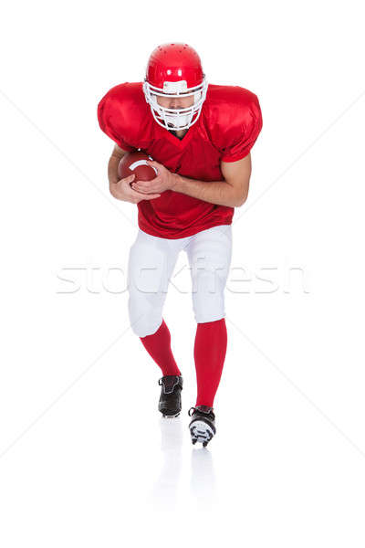 American Football player running with ball Stock photo © AndreyPopov
