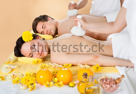 Couple Receiving Lastone Therapy Stock photo © AndreyPopov