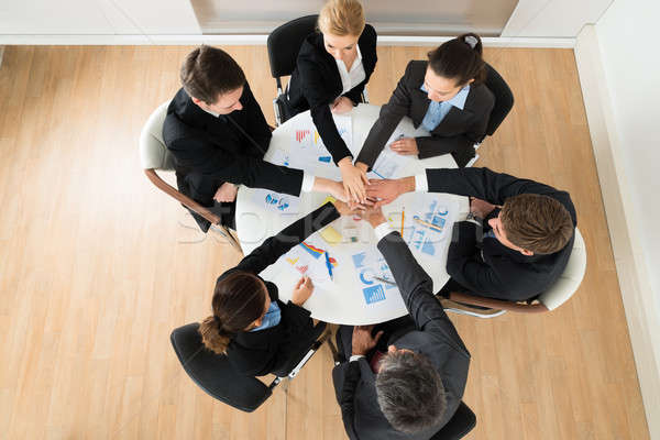 Businesspeople Stacking Hands Together Stock photo © AndreyPopov