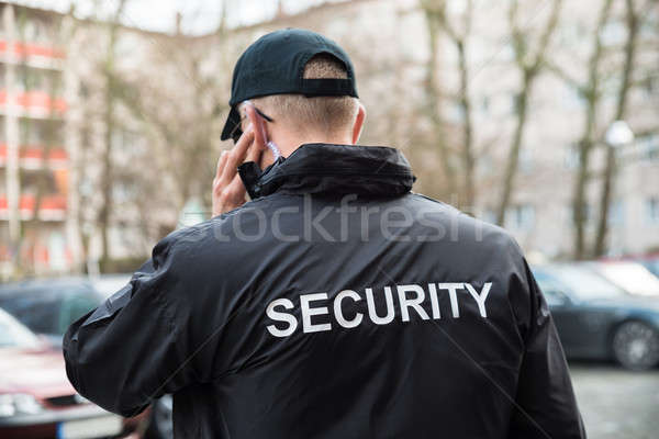 Security Guard Listening With Earpiece Stock photo © AndreyPopov