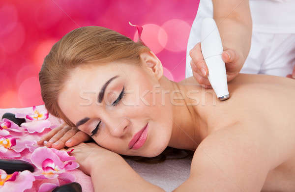 Woman Receiving Microdermabrasion Therapy At Spa Stock photo © AndreyPopov