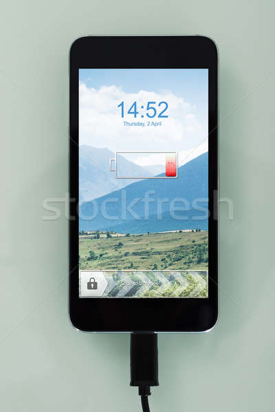 携帯電話 低い バッテリー シンボル クローズアップ ケーブル ストックフォト © AndreyPopov