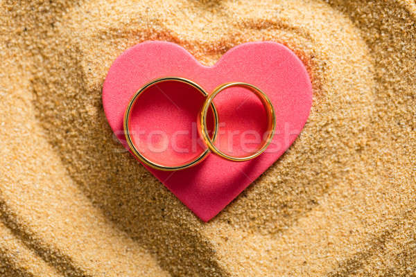 An Wedding Rings On A Heart Shape Stock photo © AndreyPopov