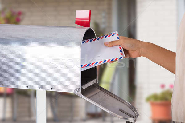 Person Removing Letter From Mailbox Stock photo © AndreyPopov