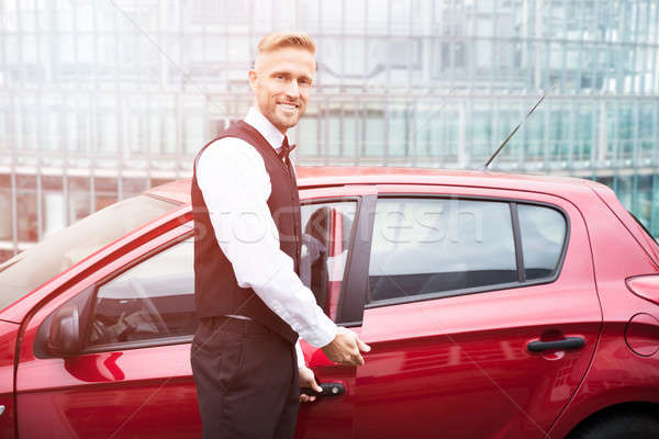 Homme ouverture voiture porte portrait élégant [[stock_photo]] © AndreyPopov