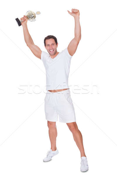 Portrait Of Young Man Holding Trophy Stock photo © AndreyPopov