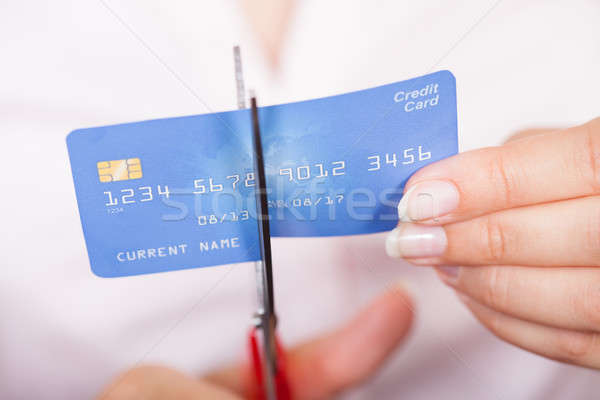 Female Cutting Credit Card Stock photo © AndreyPopov