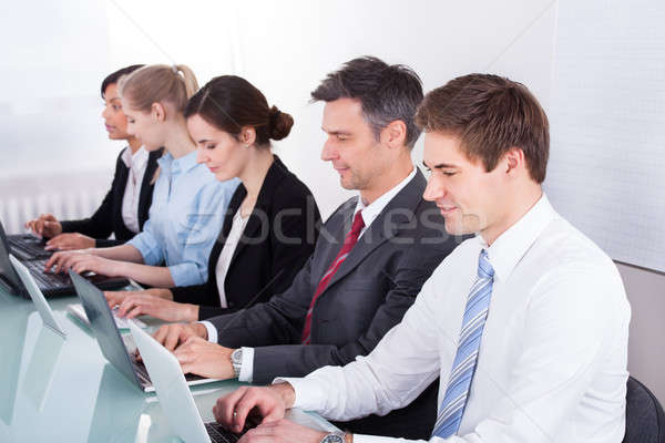 Businessman With His Colleagues Stock photo © AndreyPopov