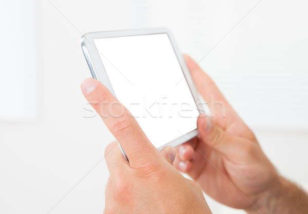 Man's Hands Holding Smartphone Stock photo © AndreyPopov