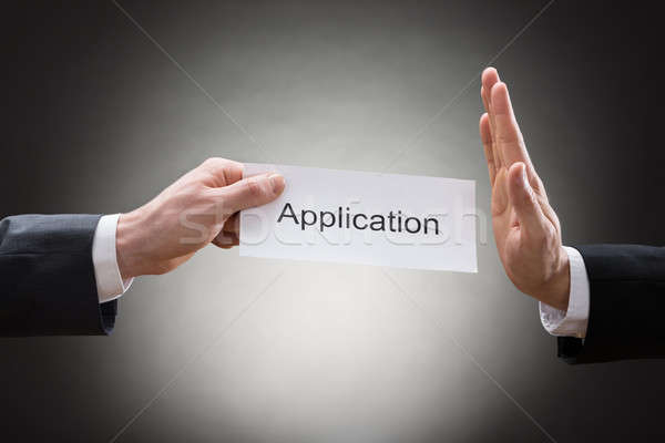 Businessman Avoiding Application Form Stock photo © AndreyPopov