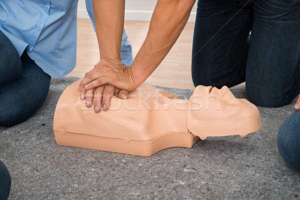 Person Practicing Cpr Chest Compression Stock photo © AndreyPopov
