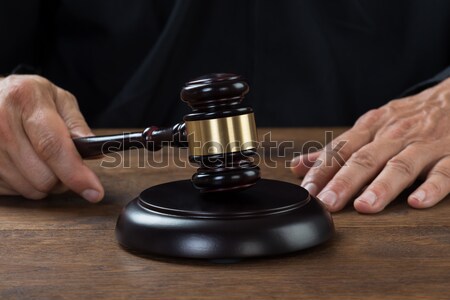 Judge Striking The Gavel At Table Stock photo © AndreyPopov