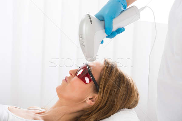 Woman Receiving Laser Hair Removal Stock photo © AndreyPopov