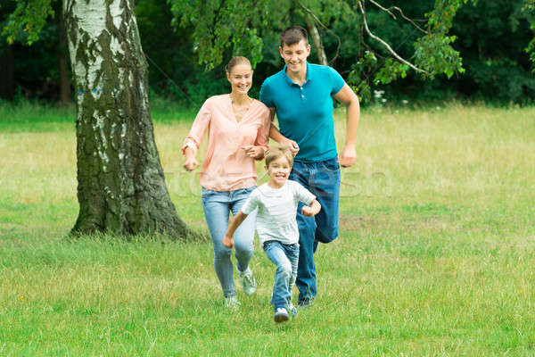 [[stock_photo]]: Garçon · courir · parent · heureux · parents