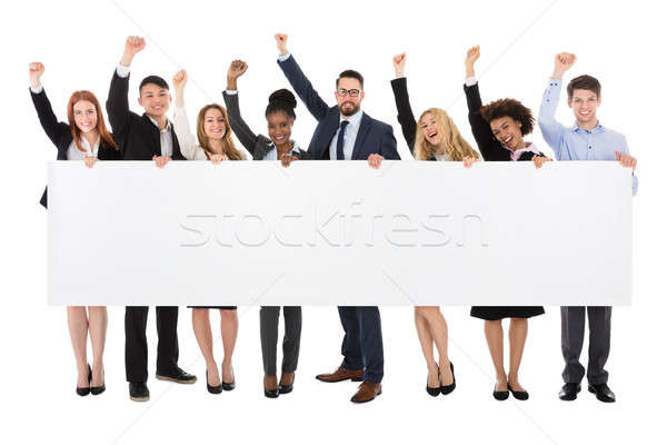 Businesspeople Holding Long Blank Banner Stock photo © AndreyPopov