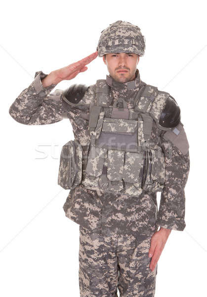 Portrait Of Man In Military Uniform Saluting Stock photo © AndreyPopov