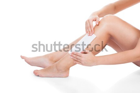 Vrouwelijke benen geïsoleerd witte achtergrond Stockfoto © AndreyPopov