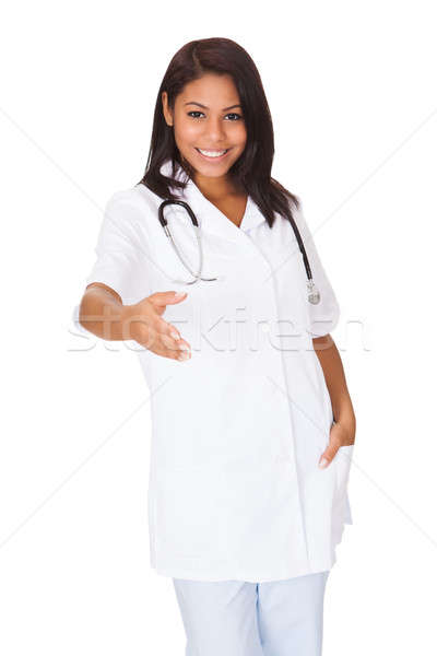 Female Doctor Extending Her Hand To Handshake Stock photo © AndreyPopov