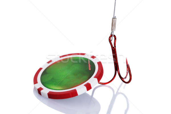 Poker Chip Trapped In Fishhook Stock photo © AndreyPopov