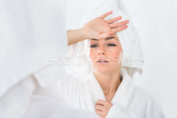Kobieta cierpienie gorączka kąpielowy szlafrok stres Zdjęcia stock © AndreyPopov