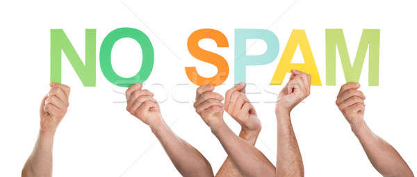 Close-up Of Hands Holding The Word No Spam Stock photo © AndreyPopov