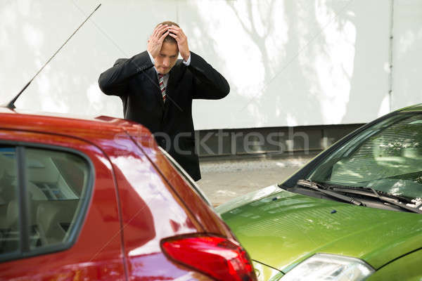 Hangsúlyos sofőr néz autó forgalom ütközés Stock fotó © AndreyPopov
