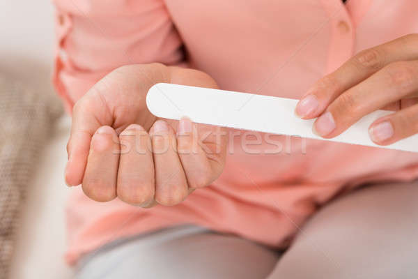 Person Hands Filing Nails Stock photo © AndreyPopov