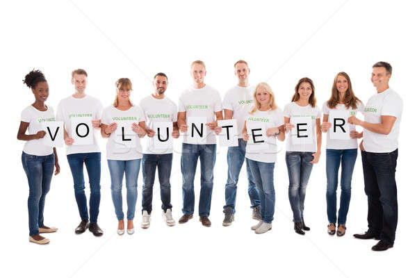 Portrait Of Confident Volunteers Holding Blank Placards Stock photo © AndreyPopov