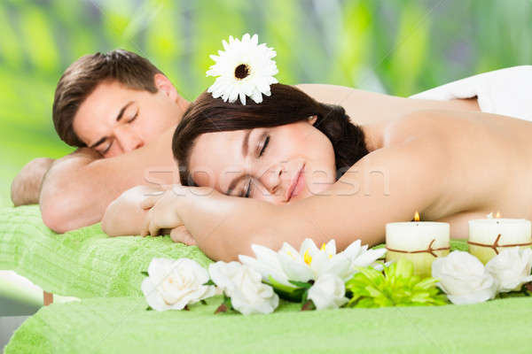 Relaxed Couple Lying At Beauty Spa Stock photo © AndreyPopov