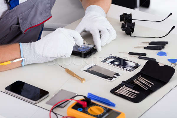 Technician Hand Fixing Cellphone Stock photo © AndreyPopov