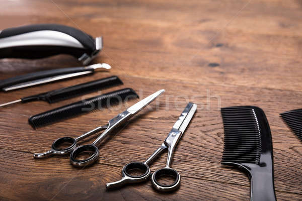 Stock photo: Hairdresser Tools On Wooden Desk
