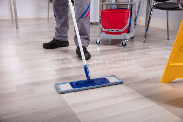 Cleaner Cleaning Floor With Mop Stock photo © AndreyPopov