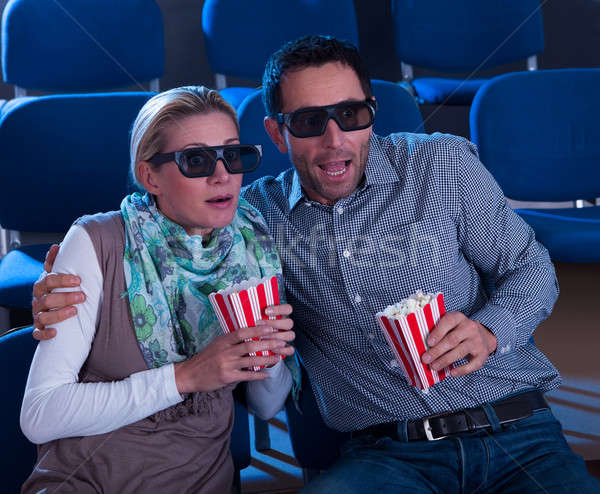 Couple reacting to a 3D movie Stock photo © AndreyPopov