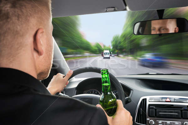 üzletember iszik sör hátsó nézet vezetés autó Stock fotó © AndreyPopov