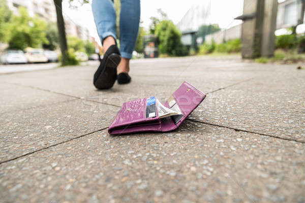 Közelkép nő pénztárca sétál utca pénz Stock fotó © AndreyPopov
