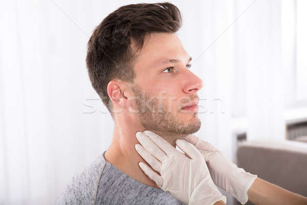 Man Getting Thyroid Gland Control Stock photo © AndreyPopov