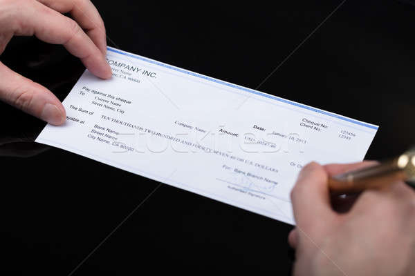 Ondertekening cheque pen business Stockfoto © AndreyPopov