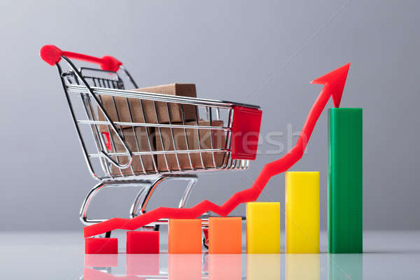 Business Graph With Red Arrow Sign Showing Upward Direction Stock photo © AndreyPopov