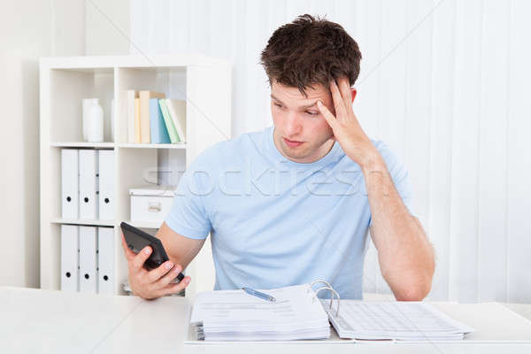 Young man having financial problems Stock photo © AndreyPopov