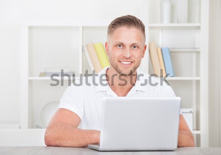 Man Using Laptop Stock photo © AndreyPopov