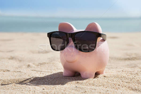 Piggy Bank With Black Sunglasses Stock photo © AndreyPopov