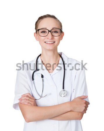Portret zâmbitor femeie medic în picioare cu bratele incrucisate Imagine de stoc © AndreyPopov