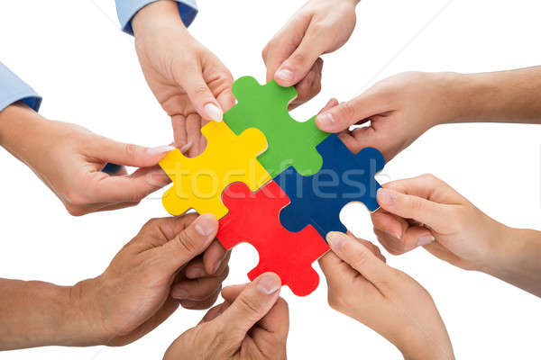People Hands Connecting Jigsaw Pieces Stock photo © AndreyPopov
