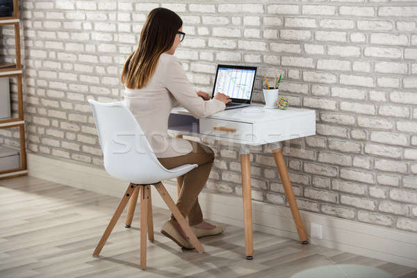 Businesswoman Analyzing The Gantt Chart Stock photo © AndreyPopov