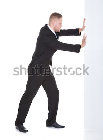 Male Secret Agent Aiming With Gun Stock photo © AndreyPopov