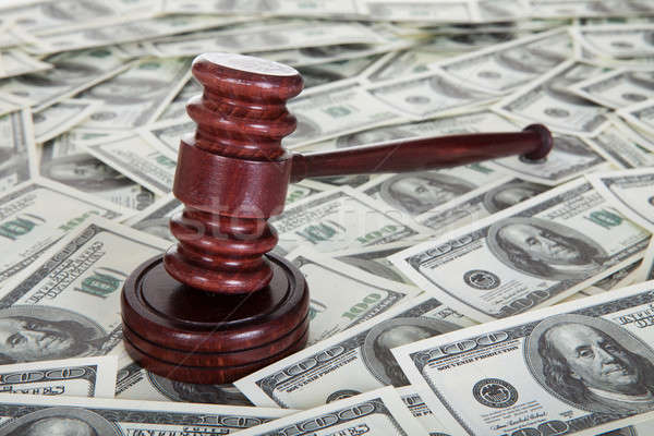 Bíró kalapács dollár dollár bankjegyek korrupció fa Stock fotó © AndreyPopov