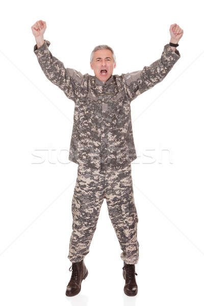 Mature Soldier Raising His Arm Stock photo © AndreyPopov